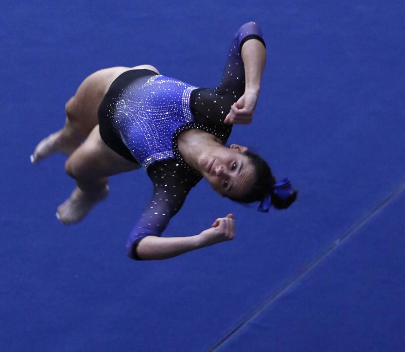 Wheaton Warrenville South's Elli Marcellaio competes in the preliminary round of the floor exercise on Friday, Feb. 21, 2025, during the IHSA Girls State Final Gymnastics Meet at Palatine High School.