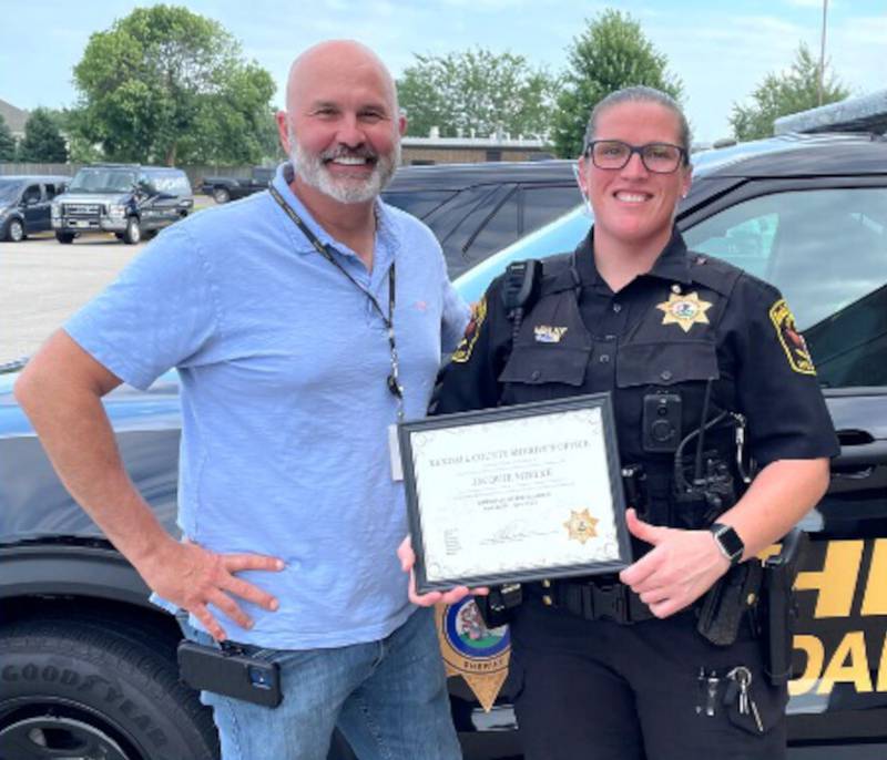 Kendall County Sheriff Dwight Baird with Employee of the Quarter Deputy Jacquelyn Mielke.