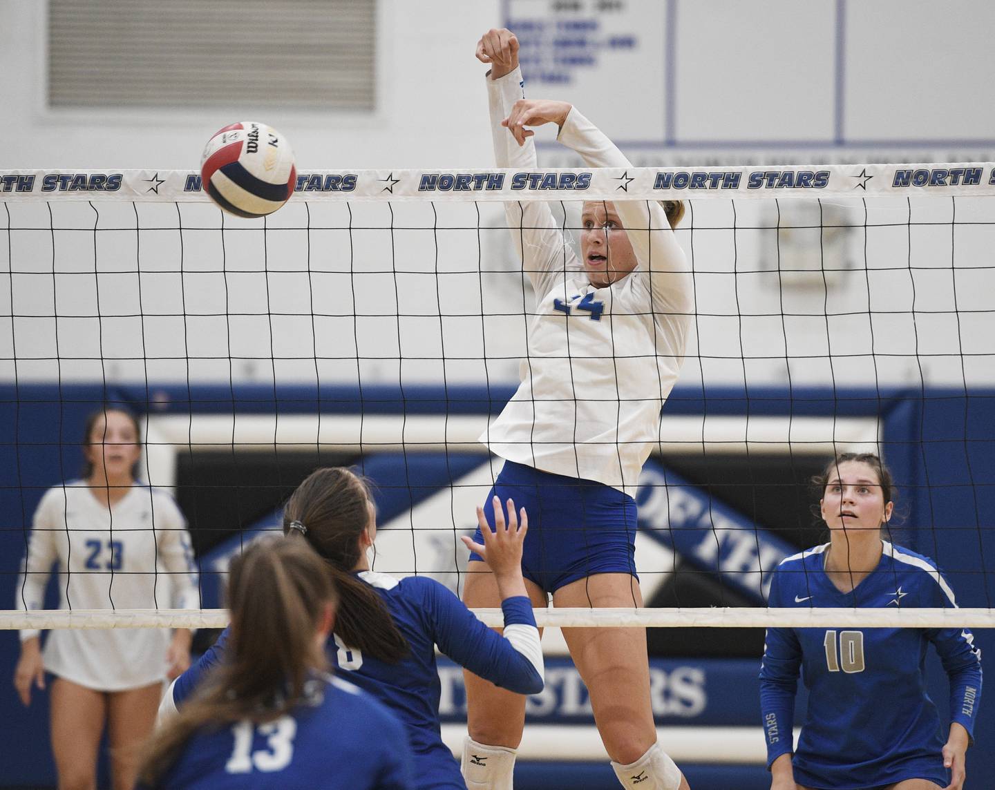 John Starks/jstarks@dailyherald.com
St. Charles North’s Katherine Scherer blocks a shot toward Rosary’s Sarah Schmidt in a girls volleyball game in St. Charles on Monday, August 22, 2022.