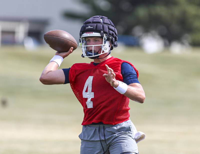 Drew Kleinhans goes through passing drills at Oswego High School Football Practice, Monday, Aug 11, 2025  in Oswego.