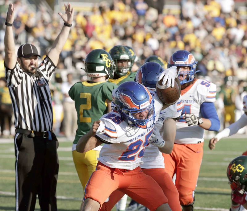 Hoffman Estates’ Dimarte Neustader, 25, celebrates a touchdown Saturday October 29, 2022 in Elk Grove Village.