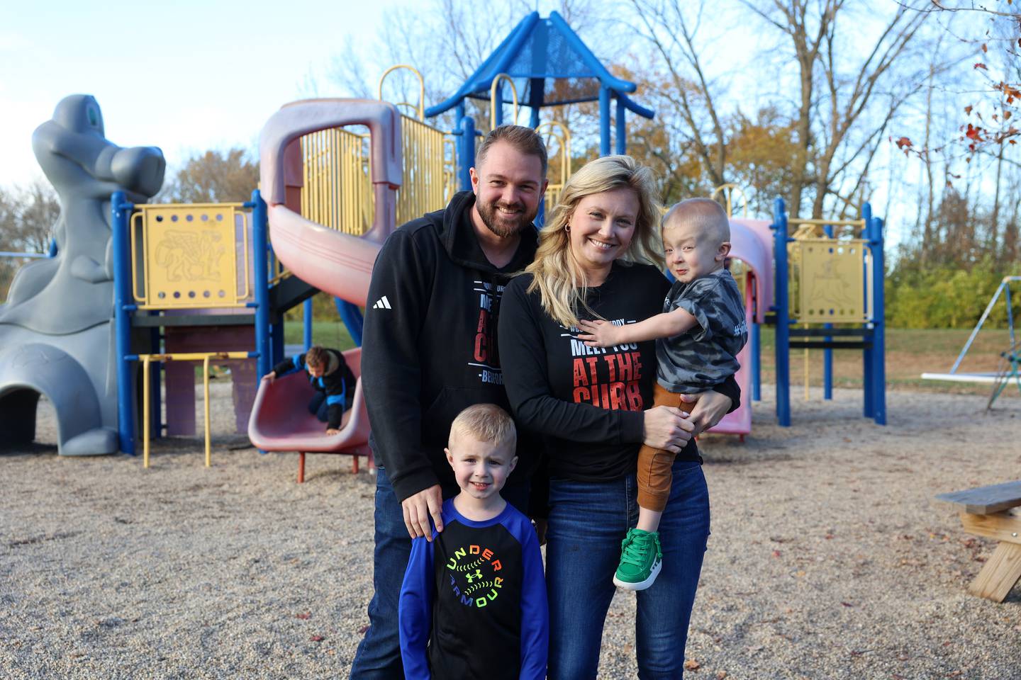 Jesse and Hollie Erickson, stand near Grace Christian Academy’s playground with their sons, Link, 4, left, and Bedford, 2.5, who was born with Schwartz-Jampel Syndrome.
The family is working to bring a new playground to the school next year through Unlimited Play, a nonprofit that builds inclusive playgrounds which chose Bedford’s Playground as the first project in their new “Together We Play” initiative.