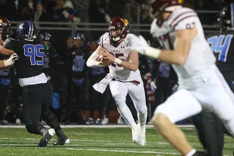 Loyola’s Ryan Fitzgerald with the quarterback keeper against Lincoln-Way East in the Class 8A semifinal on Saturday, Nov. 23, 2024 in Frankfort.