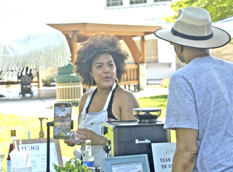 Ernie Smith orders a coffee from Candace Cisneros at the Juneteenth Fest. The Sauk Valley Diversity Alliance hosted a Juneteenth Celebration Event on Saturday, June 21st, 2025 at the Grandon Civic Center in Sterling.