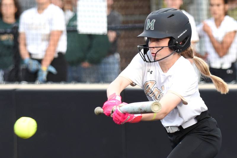 Bishop McNamara's Maddy Weiland lays down a bunt during the Class 2A Seneca Regional semifinals against Wilmington Tuesday, May 19, 2026.