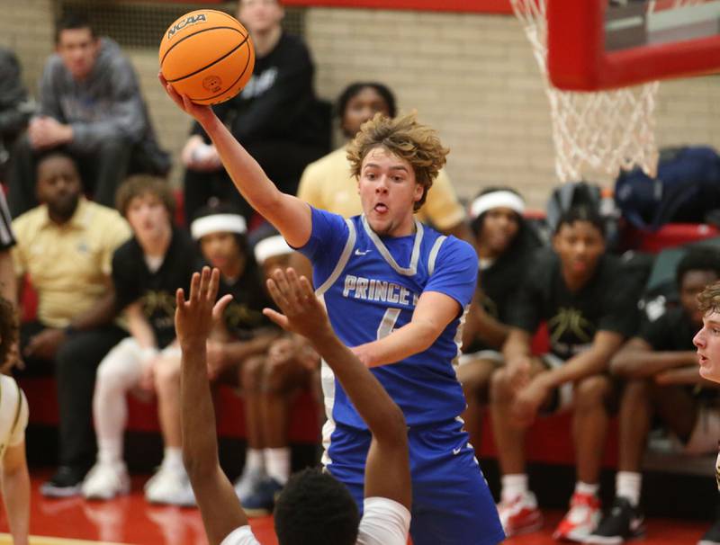 Princeton's Jayden Fulkerson looks to pass the ball around Oak Forest during the Dean Riley Shootin' The Rock Thanksgiving Tournament on Tuesday, Nov. 26, 2024 in Kingman Gym at Ottawa High School.