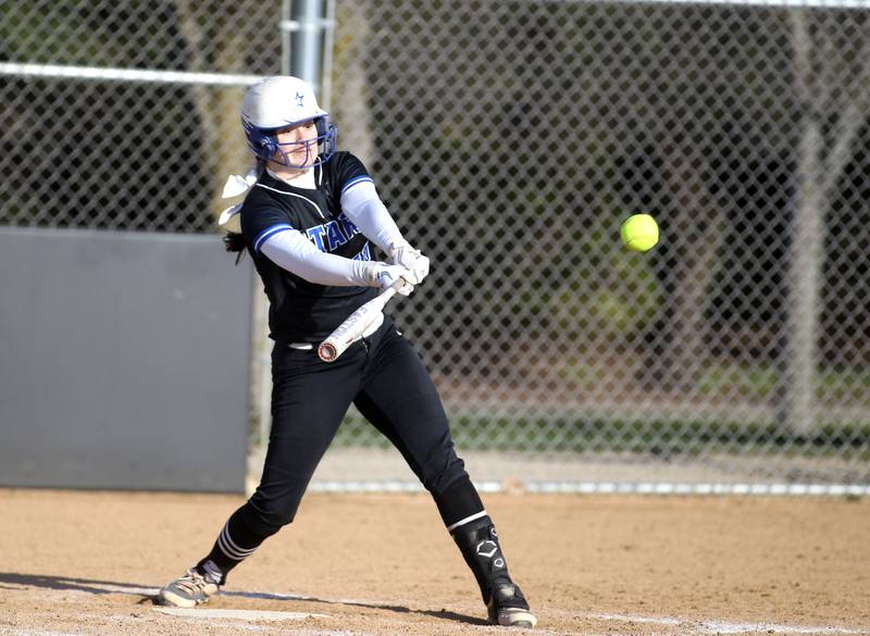 St. Charles North’s Sophia Olman makes contact during a game at Wheaton Warrenville South on Thursday, April 14, 2022.
