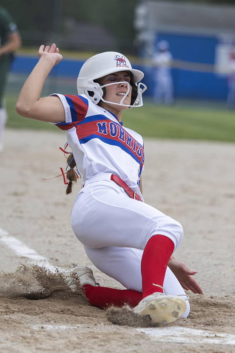 Morrison’s Harper Buikema slides in safe at home against West Carroll Tuesday, May 19, 2026, at the Class 1A softball regionals at Newman.