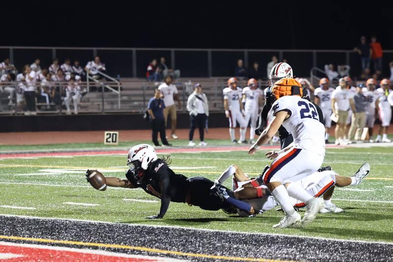 Bradley-Bourbonnais' Kyren Edmon dives to score a touchdown during the Boilermakers' victory over Stagg on Friday, Sept. 26, 2025.