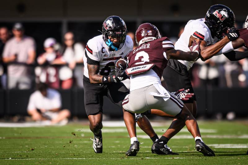 NIU wide receiver De'Aree Rogers looks to get by a Mississippi State defender in the Bulldogs' win over the Huskies on Saturday, September 20, 2025 in Starksville, Mississippi.

STARKVILLE, MS - September 20, 2025 - Photos during the Northern Illinois vs Mississippi State Bulldogs football game in Starkville,MS.  Photo by Jared Thomas