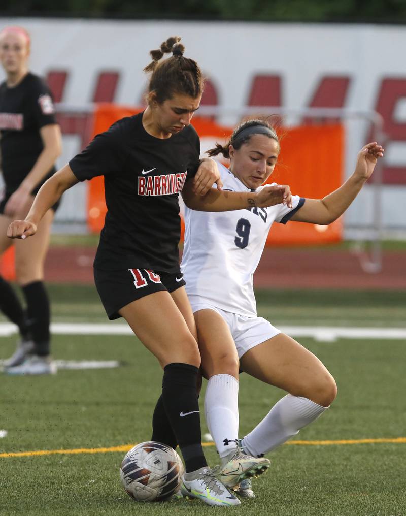 Barrington's Jazzy Fertig controls the ball in front of O'Fallon's Sadie Mueller during the IHSA Class 3A state championship match at North Central College in Naperville on Saturday, June 3, 2023.