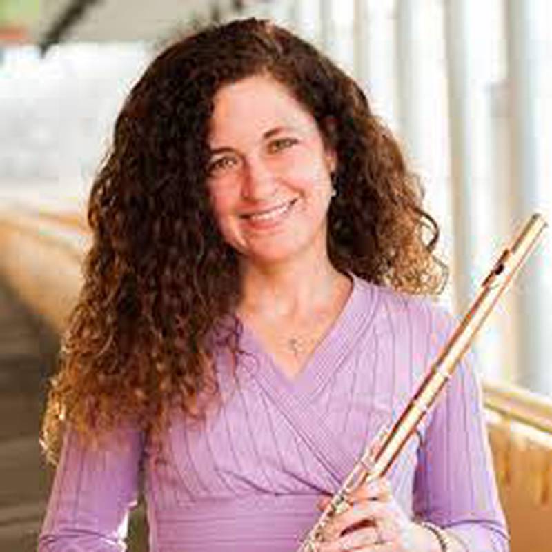 Kimberly McCoul Risinger is principal flutist in the Illinois Symphony and Chamber Orchestras and the Heartland Festival Orchestra.