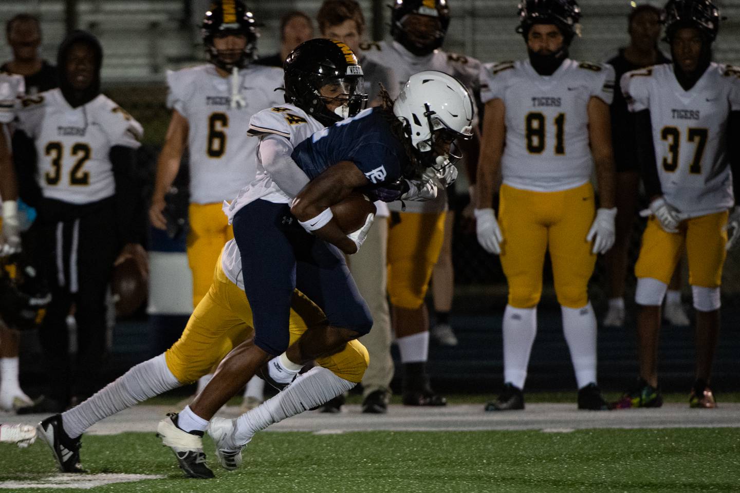 Joliet West's Sedrick Love brings down Plainfield South's  Buddy Amos during a game against Friday Oct. 4, 2024 at Plainfield South High School
