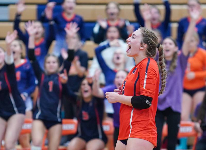 Oswego’s Grace Petasnick (2) reacts after defeating Yorkville in a volleyball match at Oswego High School on Thursday, Sept. 14, 2023.
