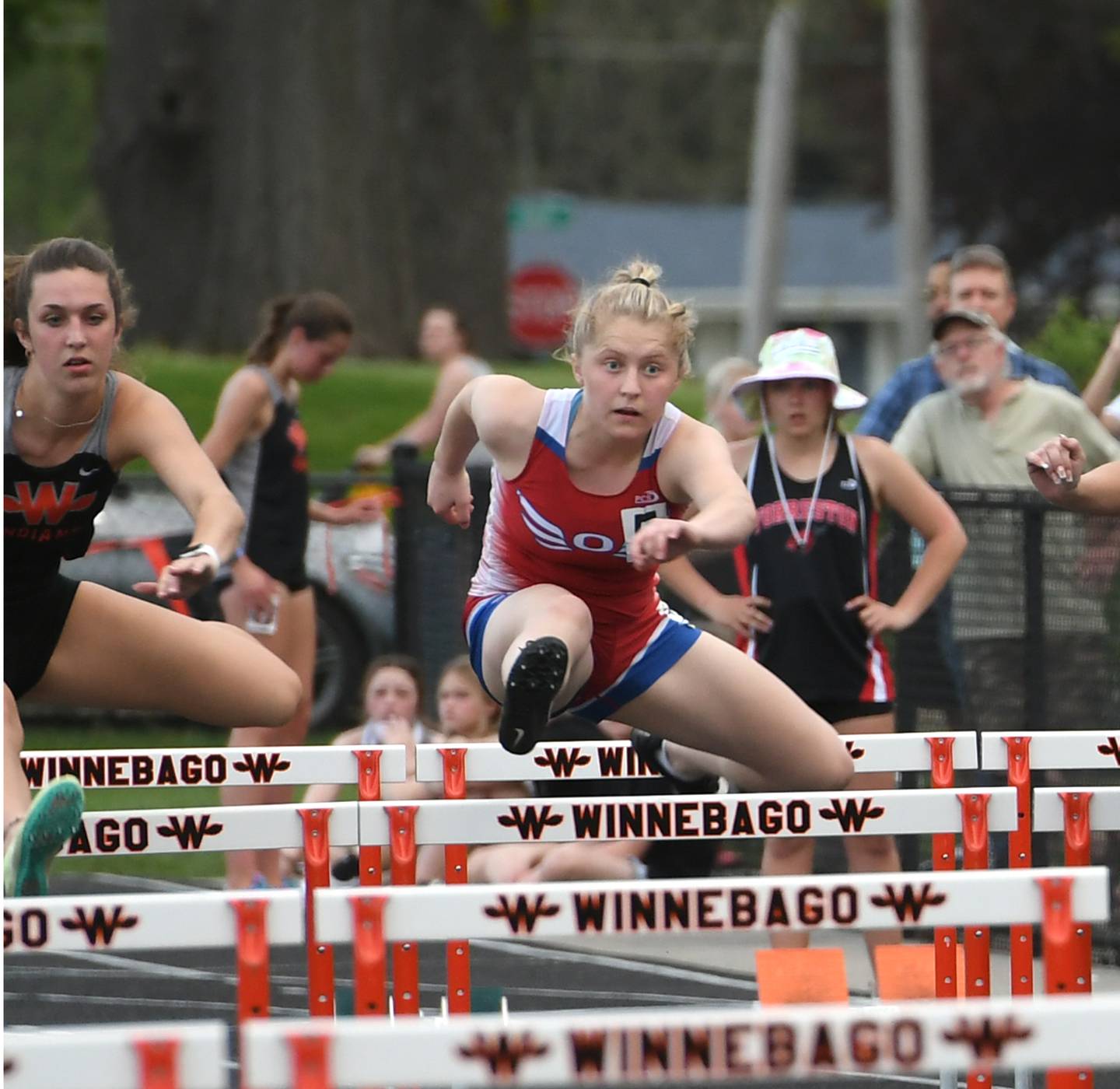 Oregon's Sophie Stender races in the 100 hurdles at the 1A Winnebago Sectional on Friday, May 13. She qualified for the state meet.