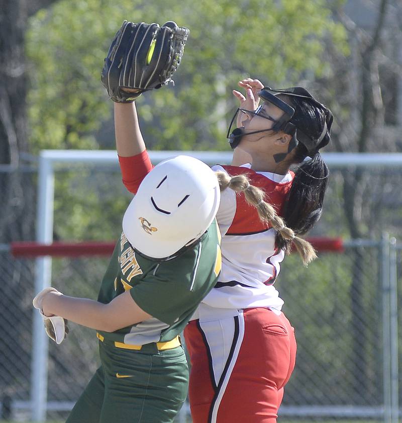 Coal City baserunner Makayla Henline and Streator second baseman Jade Williams collide on a play at second base Tuesday, April 18, 2023, in Streator.