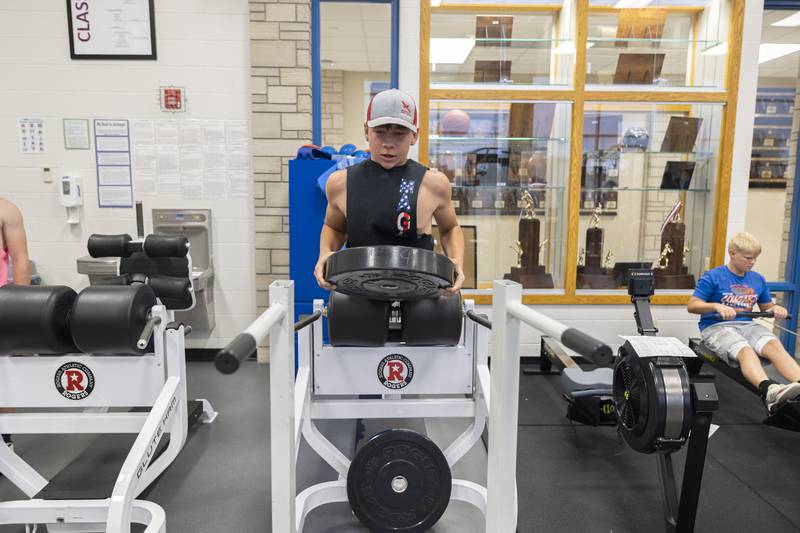 EPC football player Maxton Freier works out Monday, August 14, 2023 at the school. Storms rolling through the area kept the team in doors for practice.