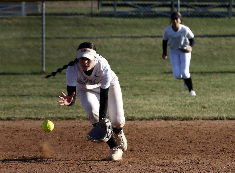 Huntley's Aubrina Adamik tries to field a ball during Fox Valley Conference softball game against Crystal Lake Central on Tuesday, April 8, 2025, at Huntley High School.