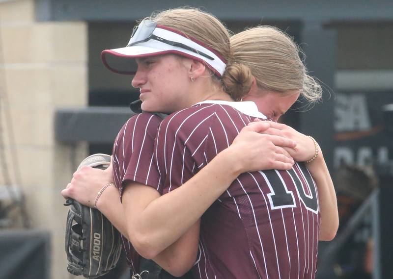 Prairie Ridge's Kylie Carroll and her sister Kendra hug after defeating Burbank St. Laurence during the Class 3A State third place game on Saturday, June 14, 2025 at the Louisville Slugger Sports Complex in Peoria.