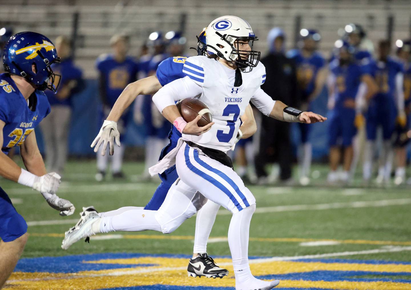 Geneva's Nate Stempowski (3) moves the ball upfield during the IHSA Class 6A playoff game Friday November 3, 2023 in Lake Forest.