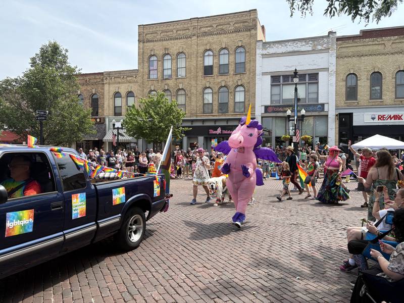 The Read Between the Lynes float participates in the Woodstock Pride parade June 15, 2025.