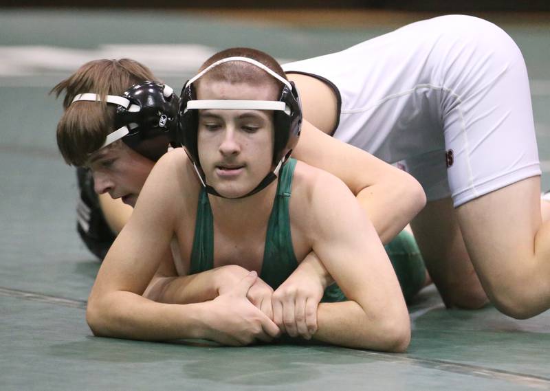 St. Bede's London Boggio wrestles Orion's Cavan Terry during a triangular meet on Wednesday, Jan. 18, 2023 at St. Bede Academy.