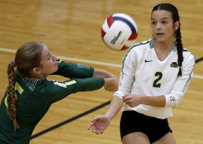 Crystal Lake South's Layla Addison passes the ball forward in front of her teammate, Olivia Kouretsos, during a Fox Valley Conference volleyball match against McHenry on Thursday, Aug. 28, 2025, at the Freshman Campus of McHenry High School in McHenry.