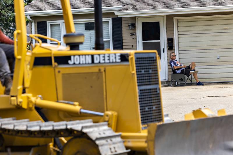 Bob Dickson of Sterling watches the work being done on the new parking area at Sterling's Thomas Park on Thursday, Aug. 7, 2025. Dickson is excited for the new lot to relieve the congestion, especially when school is back in session.