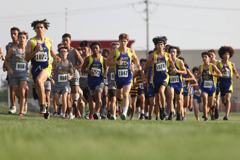 Joliet Central runners take off in the Joliet West Cross Country Dual Meet on Monday, Aug. 28, 2023 in Joliet.