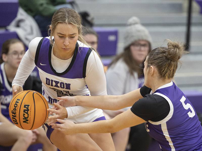 Dixon's Reese Dambman has the ball knocked away by Rochelle’s Payton Ceserone Thursday, Dec. 26, 2024, during the Dixon Girl’s KSB Holiday Basketball Tournament.
