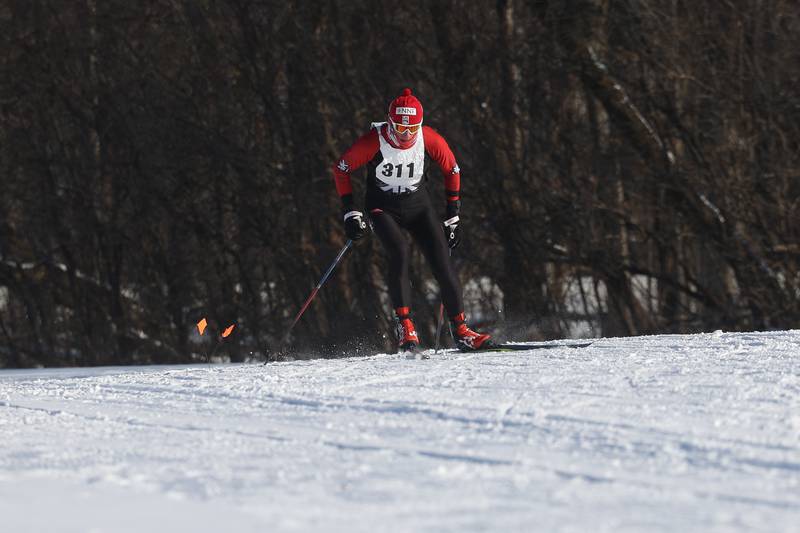 Jan Myrda, Former Polish national team and World Cup racer, finishes the first lap in the Joliet Nordic Ski Club 12k race on Saturday, Jan. 20th, 2024 at Woodruff Golf Course in Joliet.