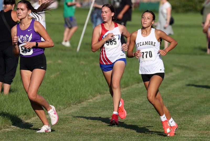 Sycamore’s Chloe Shere makes a turn Tuesday, Sept. 2, 2025, during the Sycamore Cross Country Invitational at Northern Illinois University in DeKalb.