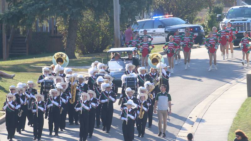 Members of the L-P band and Cavalettes march during the L-P Homecoming parade on Thursday, Sept. 26, 2024 near the corner of 7th Street and Orleans Street in Peru.