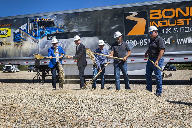 Danny Langloss (left), Tom Demmer, Bob Bonnell, Joe Bonnell and Bill Hintzsche dig out shovels of gravel to mark the groundbreaking of Bonnell Industries’ new facility Wednesday, August 30, 2023 in Dixon.
