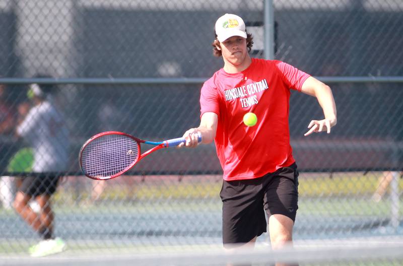 Hinsdale Central’s Aidan Hernandez returns the ball during a doubles match with partner Bodie Teuscher (not pictured) in the state championship preliminaries at Buffalo Grove High School on Thursday, May 23, 2024.