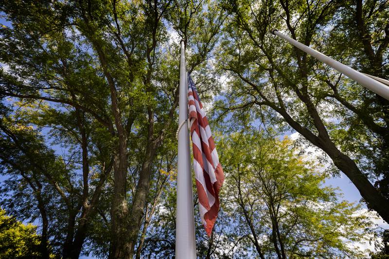 A flag hangs at half-staff Thursday, Sept. 11, 2025, outside of the Reagan Boyhood Home in recognition of 9/11.