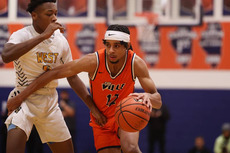 Romeoville’s Troy Cicero Jr. makes a move against Joliet West on Tuesday January 31st, 2023.
