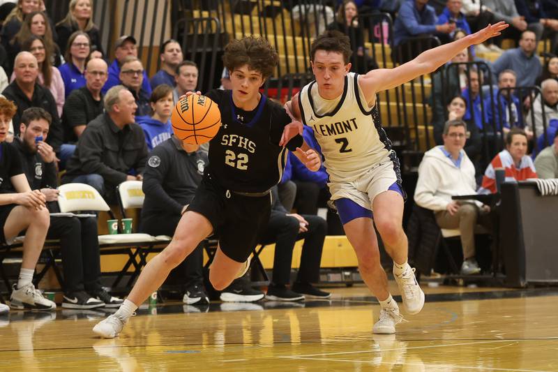 St. Francis’ Luke Dufresne drives around Lemont’s Sean Murray in the Class 3A Hinsdale South Regional semifinal game on Tuesday, March 3, 2026 in Darien.