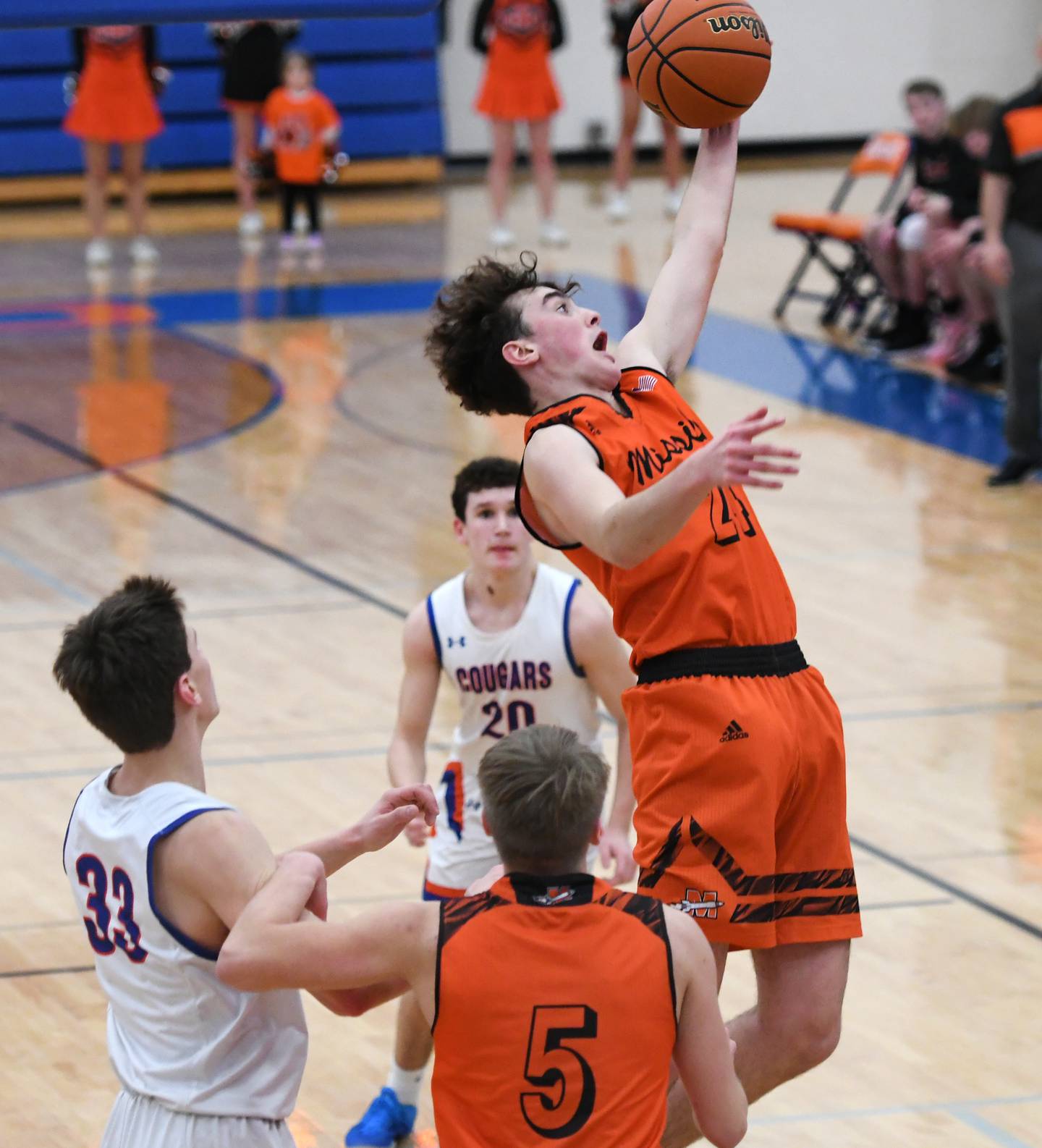Milledgeville's Colton Hendick (24) jumps for a rebound during 1A regional action against Eastland in Lanark on Saturday.
