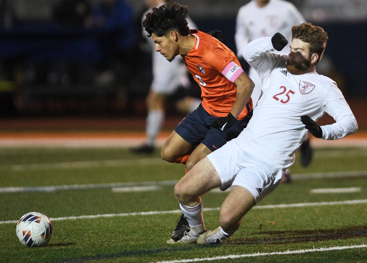 John Starks/jstarks@dailyherald.com
Romeoville’s Joseph Duarte steps on the foot of Naperville Central’s Sean O'Reilly in the Class 3A championship game of the boys state soccer tournament in Hoffman Estates on Saturday, November 5, 2022.