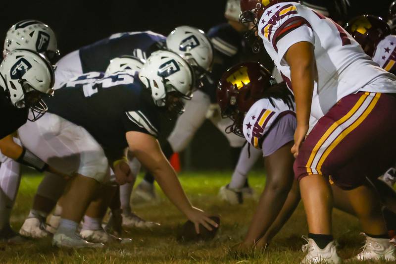 Fieldcrest and Westmont players line up for a Fieldcrest play on Friday, September 20, 2024 at Fieldcrest high school in Minonk.