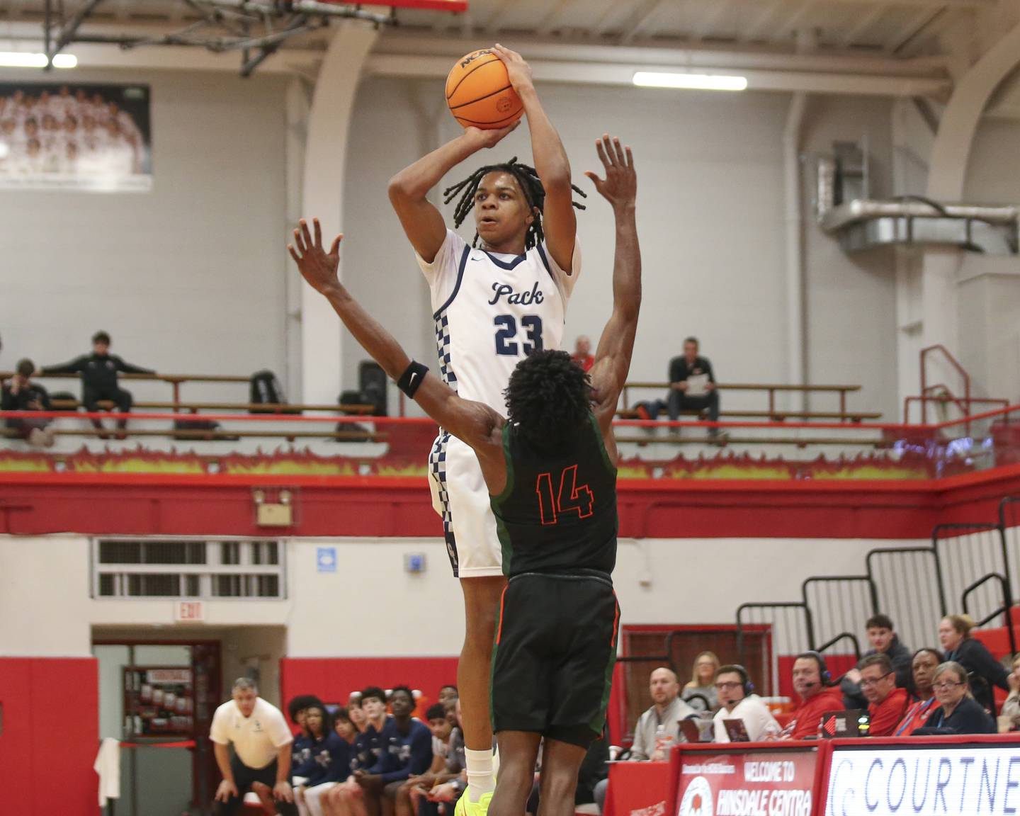 Oswego East's Mason Lockett (23) shoots a jumper during their Hinsdale Central Holiday Classic basketball game between Morgan Park at Oswego East Saturday, Dec 27, 2025 in Hinsdale.