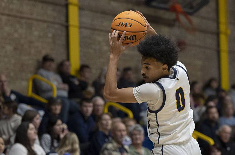 Sterling’s Xavian Prather takes a pass against Geneseo Friday, Dec. 5, 2025.