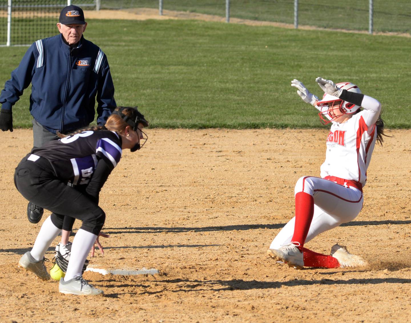 Oregon's Kaelin Shaffer slides into second during a game with Dixon on Friday, April 5, 2024 at Oregon Park West