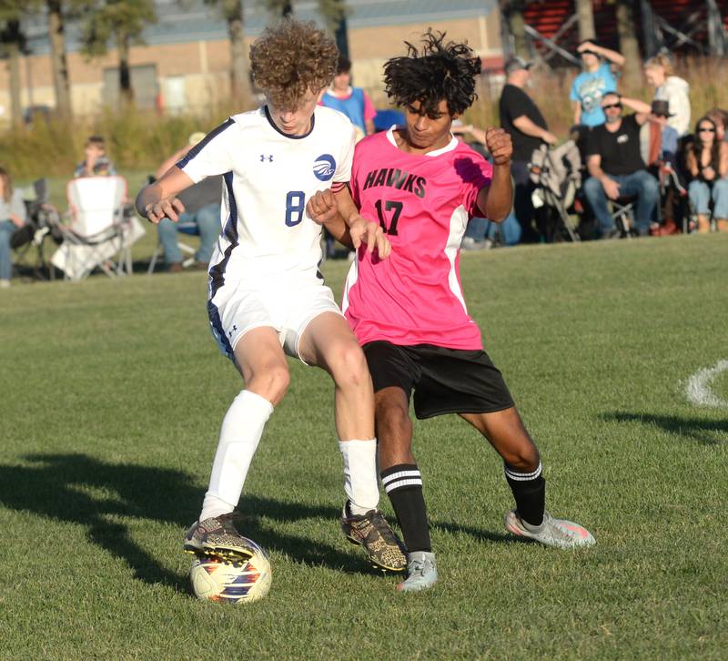 Faith Christian's Jaxen Coester blocks Oregon's Irvin Acosta from the ball during a Thursday, Oct. 9, 2025 game at Oregon Park West.