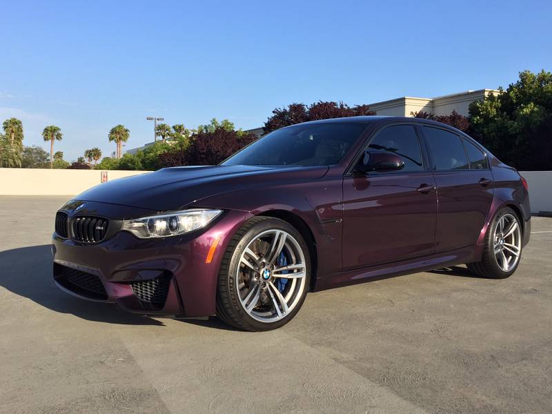 The 2024 BMW i4 Gran Coupe is available in Mora Metallic (aka purple).