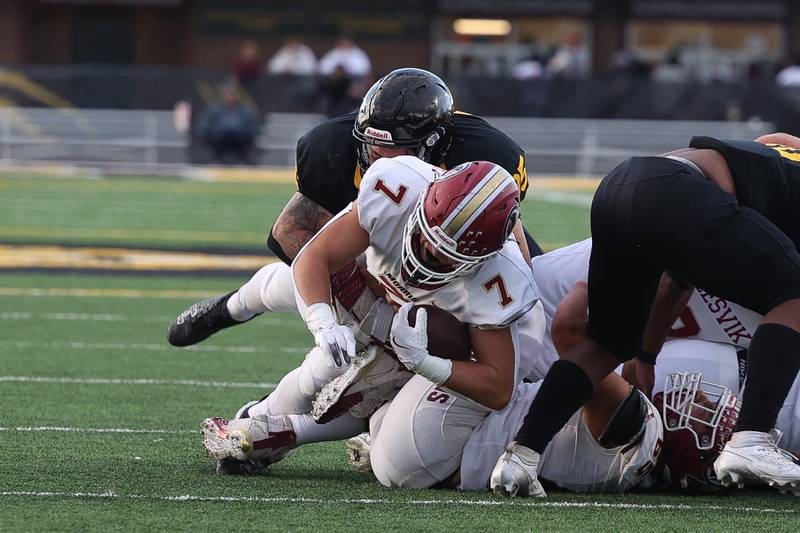 Morris’ Griffin Zweeres dives forward for the first down against Joliet West on Friday, Sept. 6, 2024 in Joliet.