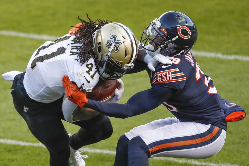 Chicago Bears free safety Eddie Jackson (39) tackles New Orleans Saints wide receiver Deonte Harris (11) during the first half of an NFL football game, Sunday, Nov. 1, 2020, in Chicago. (AP Photo/Kamil Krzaczynski)