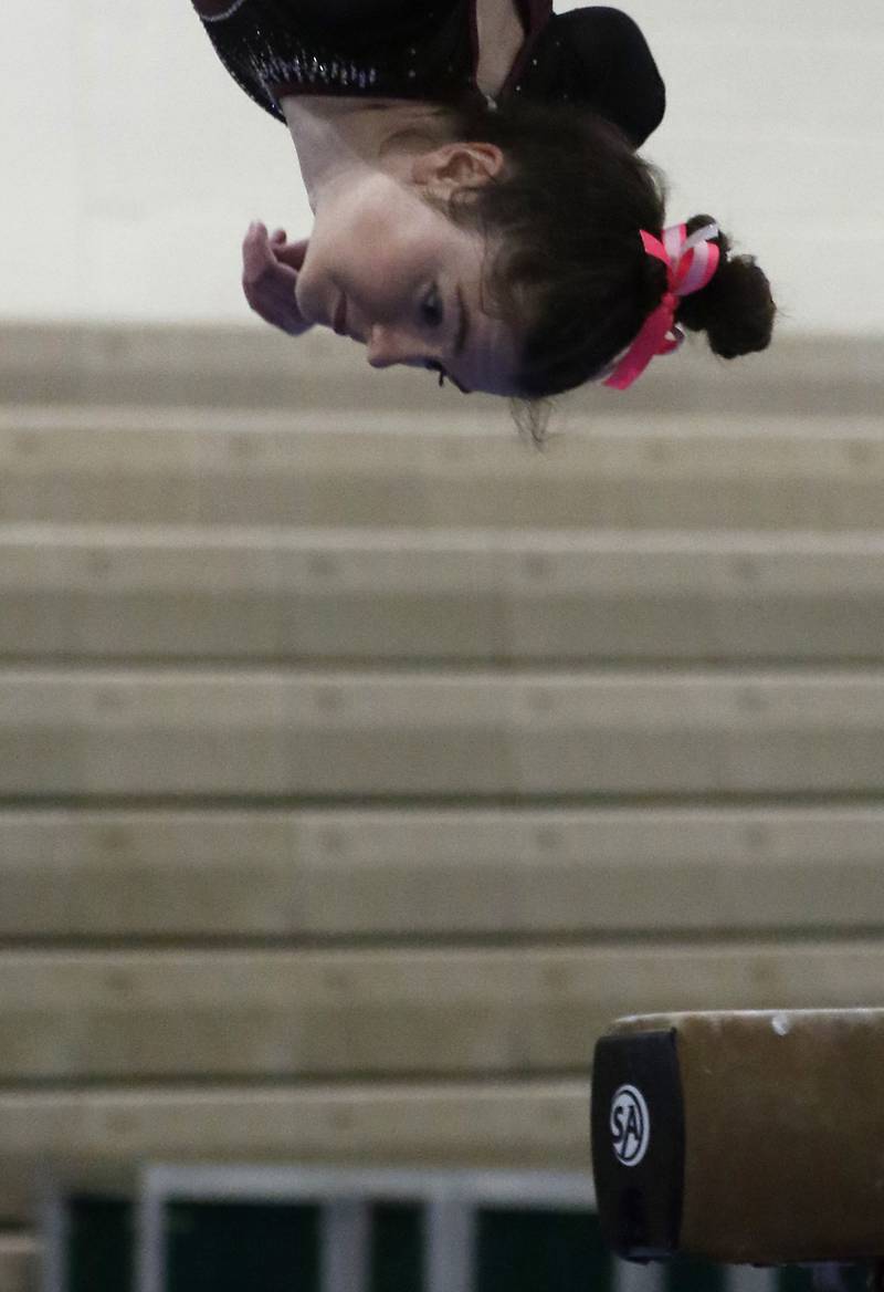 Prairie Ridge’s Delaney Wolfe competes on the balance beam Wednesday, Feb. 8, 2023, during  the IHSA Stevenson Gymnastics Sectional at Stevenson High School in Lincolnshire.