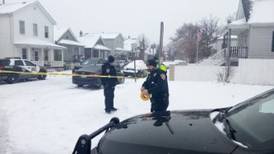 PHOTOS: Police investigate shooting deaths of woman, child in Joliet